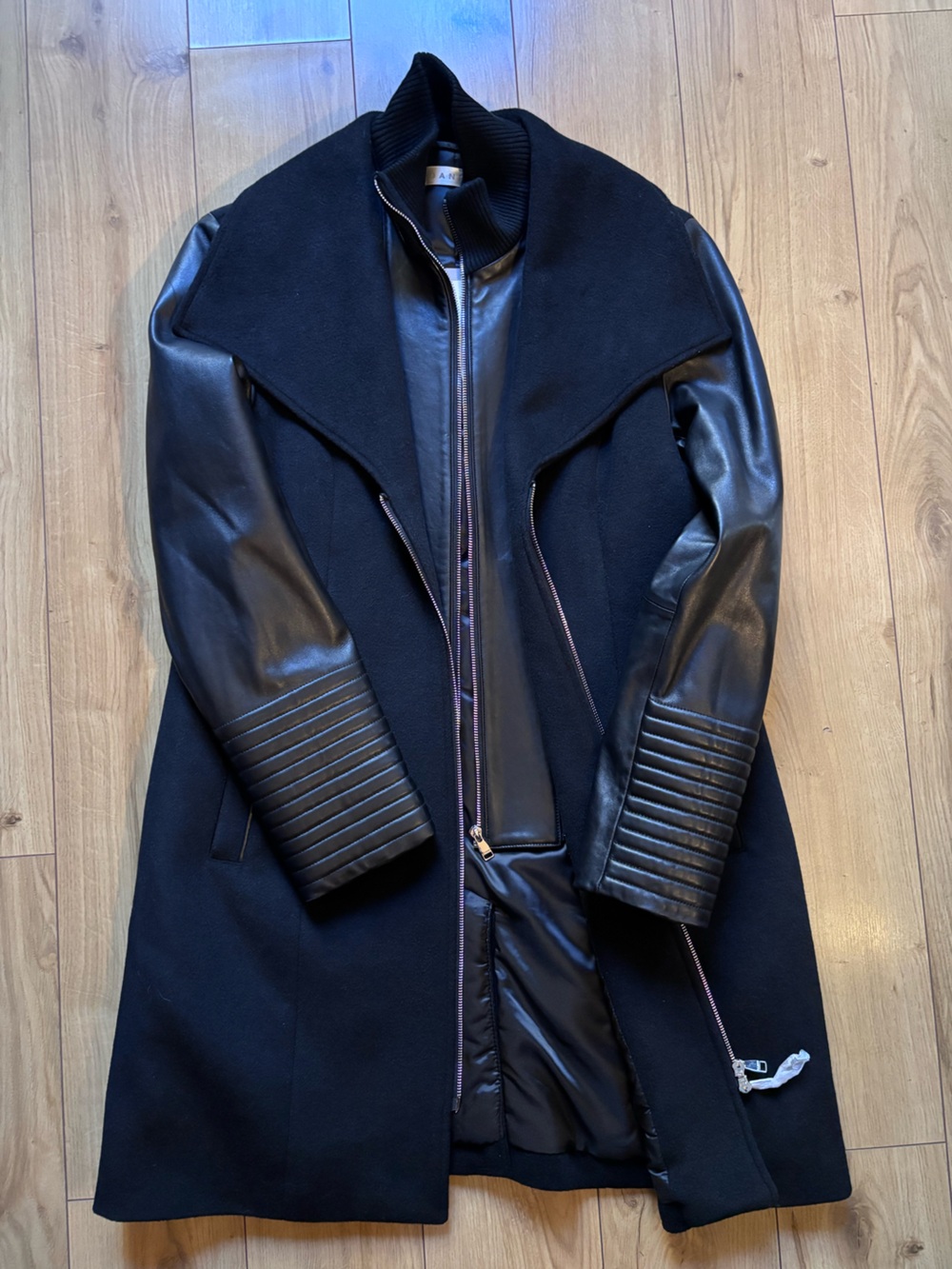 Danier Leather black wool and leather coat.